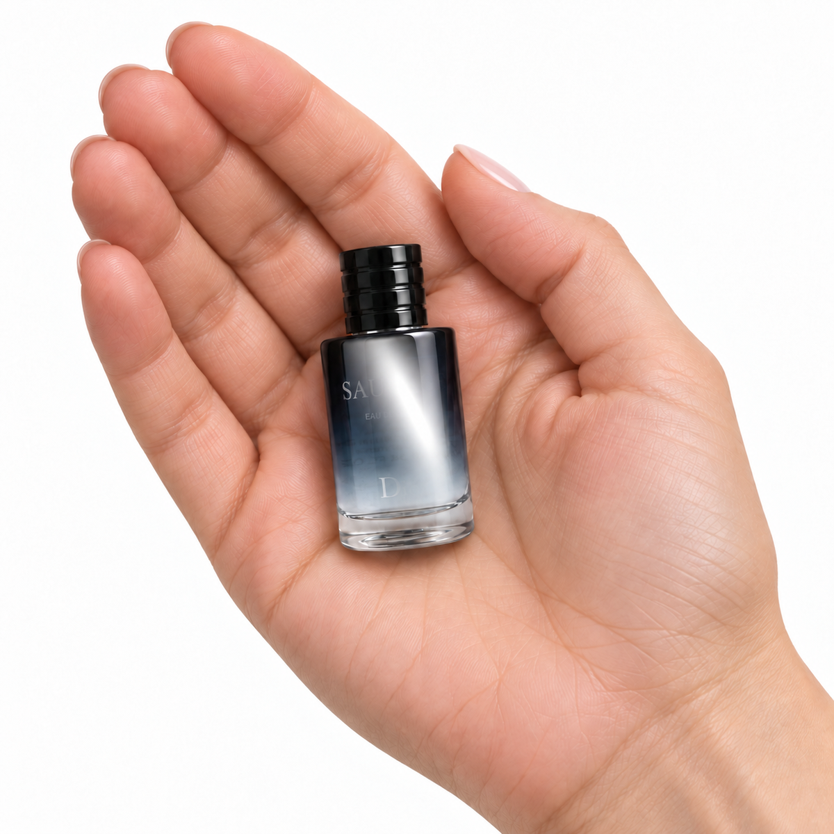 Blue Hour 10ml miniature resting in a palm on white