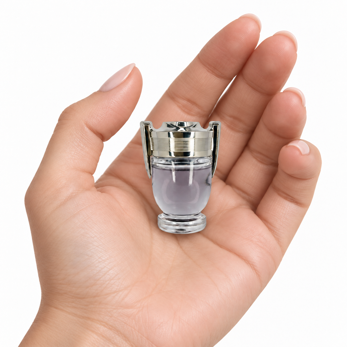 Silver Wake 5ml miniature resting in a palm on white