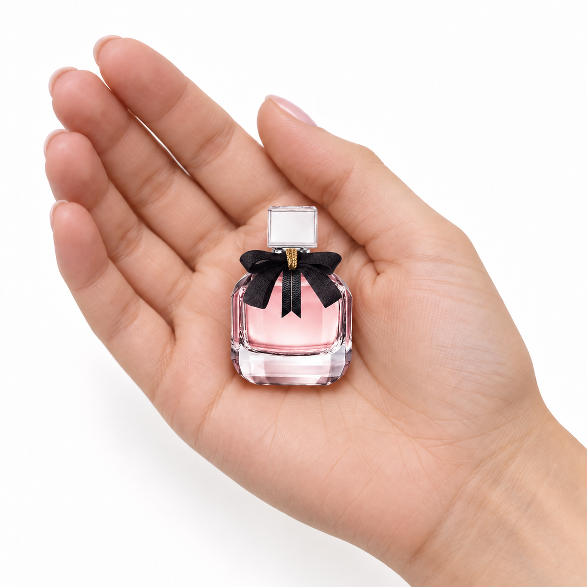 Berry Rendezvous 7.5ml miniature resting in a palm on white
