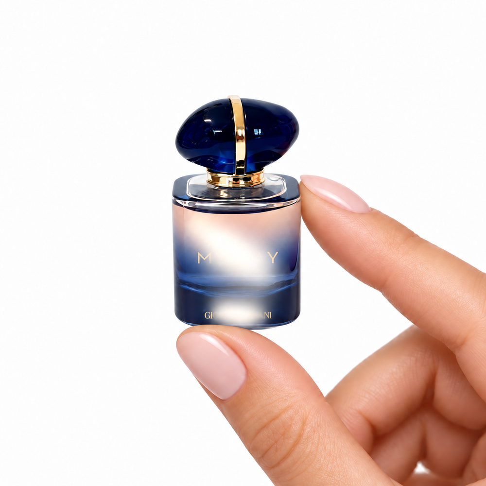 Iris Veil 7ml miniature held between fingertips on white